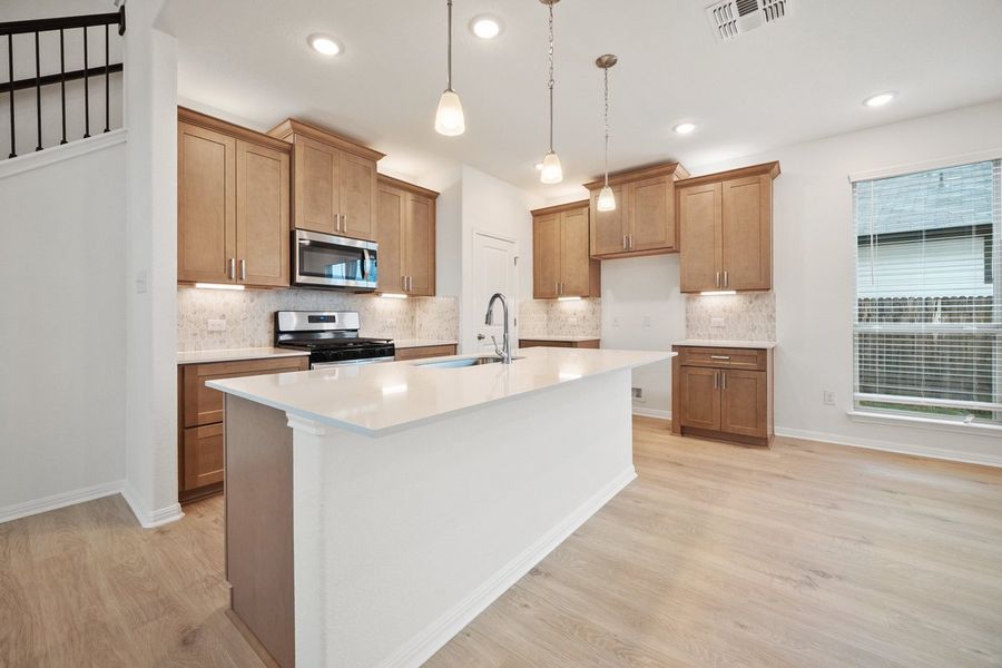 Furnished interior view inside a new home in The Hills of Bear Creek, Manchaca (Image 9).