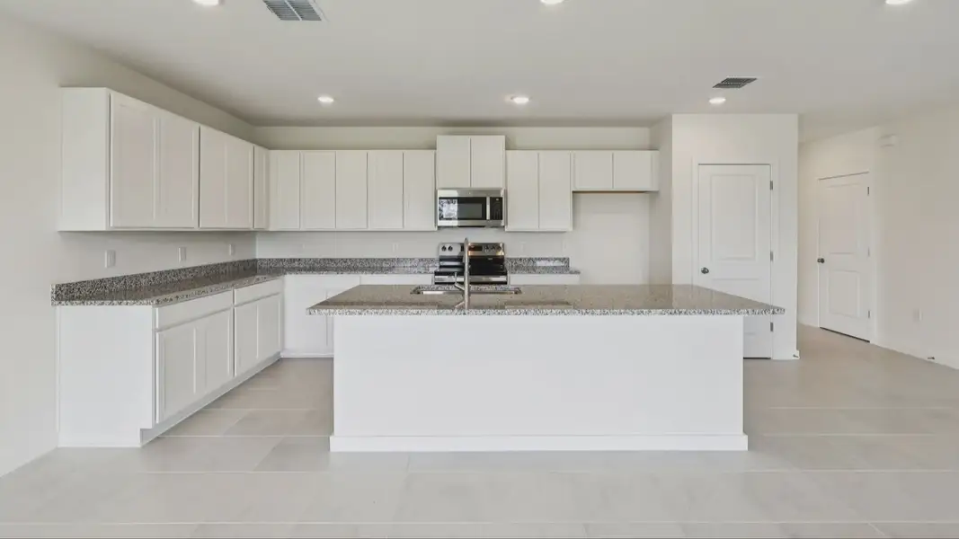 Furnished interior view inside a new home in Willowbrook North, Winter Haven (Image 9).