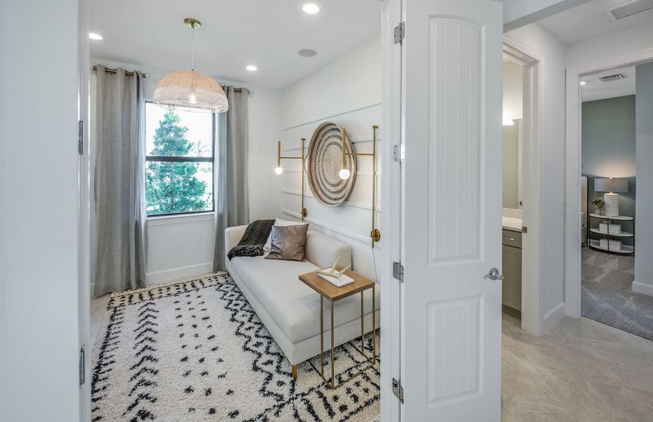 Furnished interior view inside a new home in Del Webb Oak Creek, North Fort Myers (Image 8).