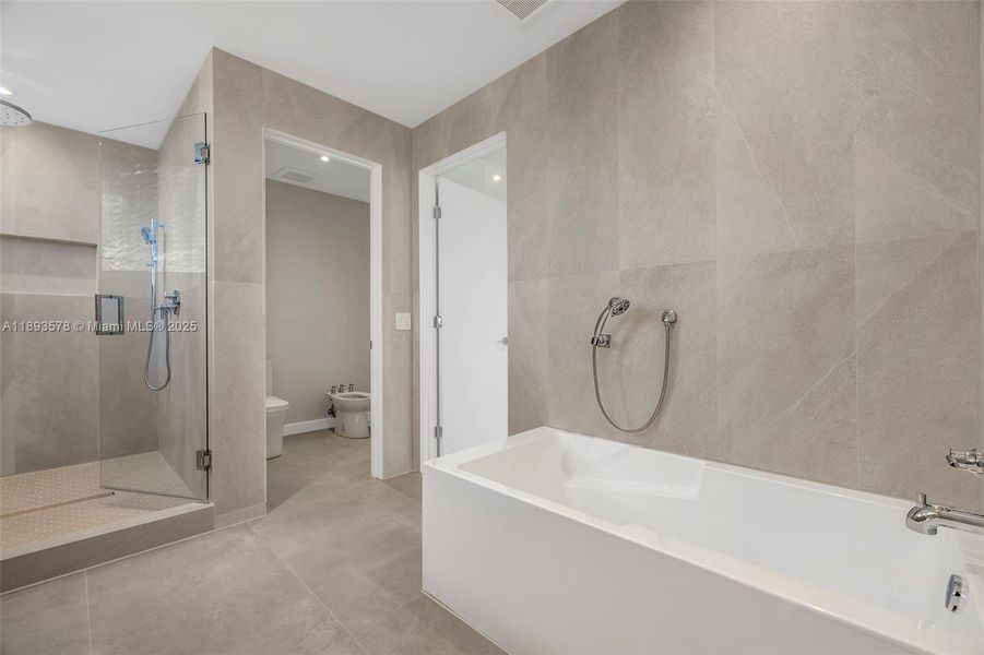 Primary Bathroom with Tub & Shower