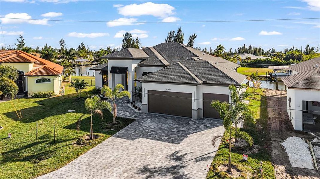 Front exterior of a new home in , Port Charlotte, FL, highlighting curb appeal (Image 20).