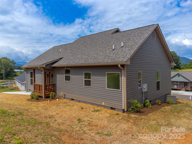 Front exterior of a new home in , Franklin, NC, highlighting curb appeal (Image 23).
