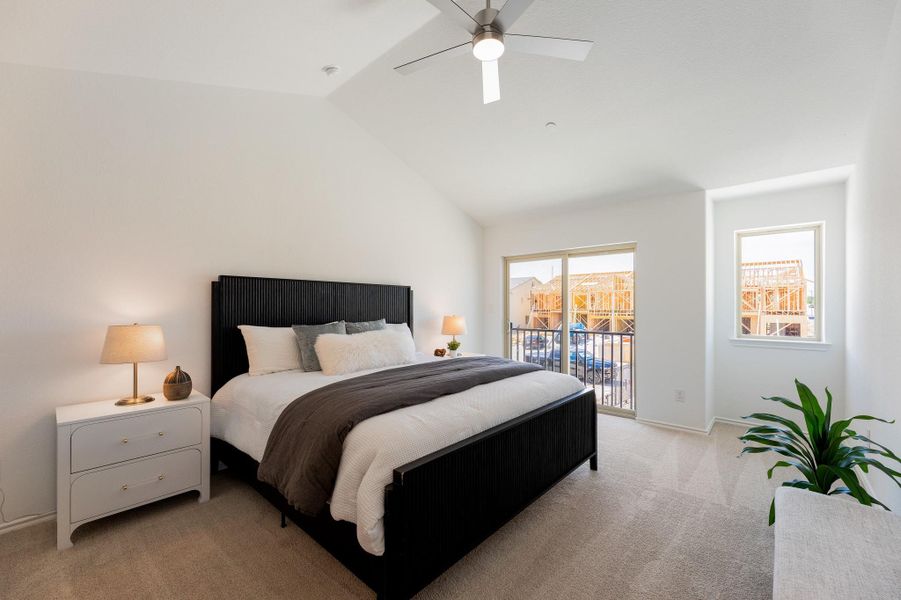 Bedroom with light colored carpet, access to outside, and ceiling fan