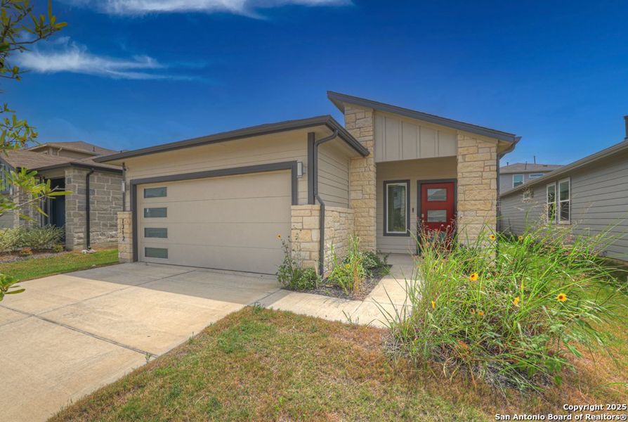 Front exterior of a new home in , San Marcos, TX, highlighting curb appeal (Image 1). Front exterior of a new home in , San Marcos, TX, highlighting curb appeal (Image 1).
