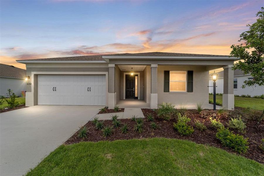 Front exterior of a new home in , Ocala, FL, highlighting curb appeal (Image 20). Front exterior of a new home in , Ocala, FL, highlighting curb appeal (Image 20).