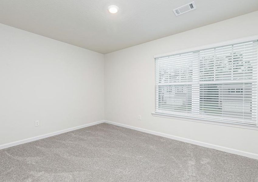 The third bedroom offers an impressive window that lets in plenty of bright, natural light