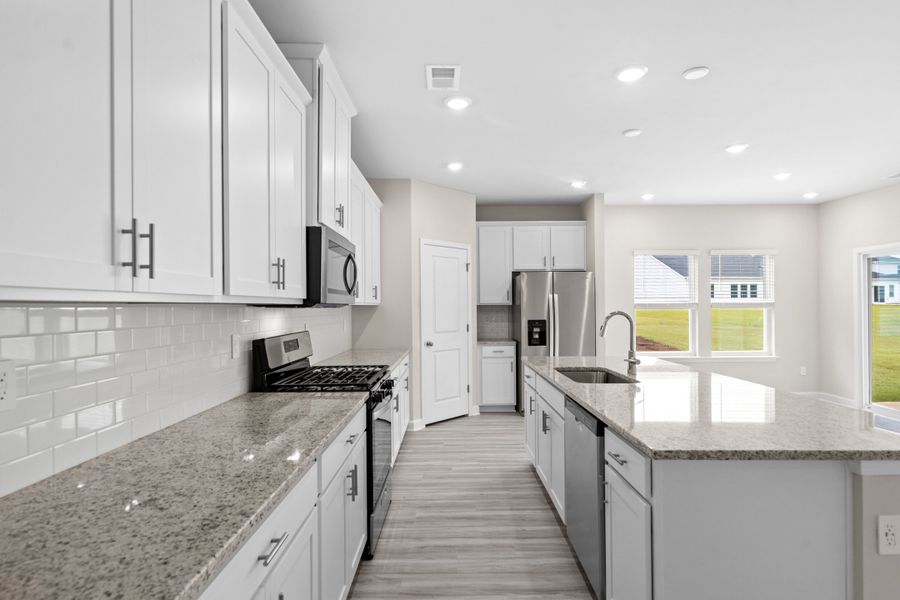 Furnished interior view inside a new home in Cypress Ridge - The Coastline Series, Longs (Image 7).