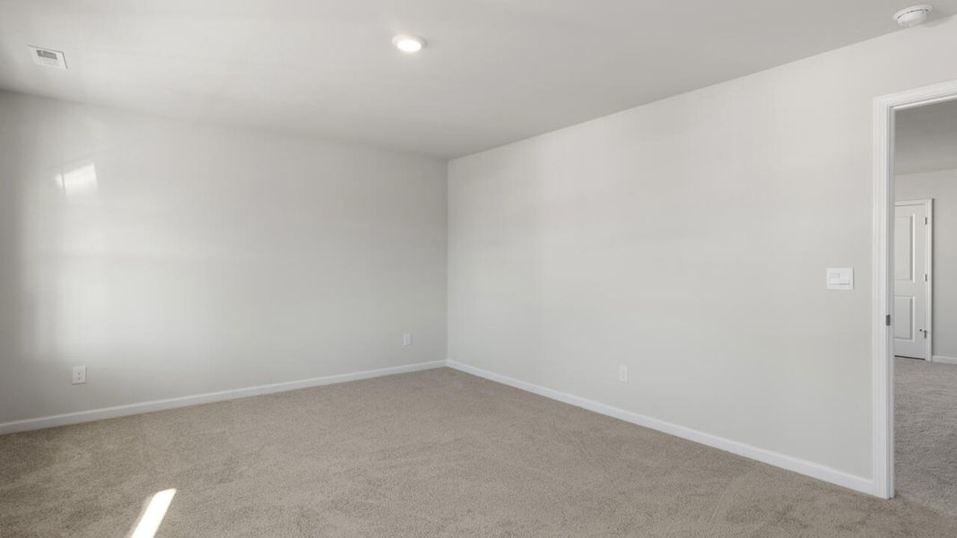 Spacious, unfurnished interior of a new home in The Haven at Indigo Preserve, Leland (Image 36).