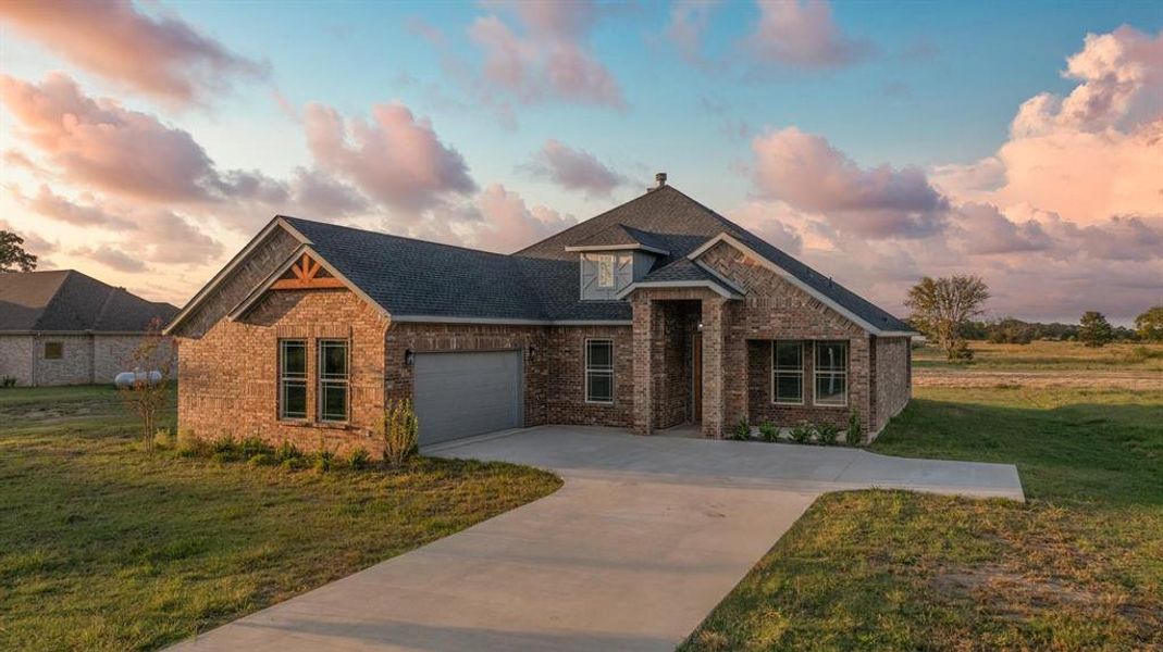 Front exterior of a new home in , Alba, TX, highlighting curb appeal (Image 2).