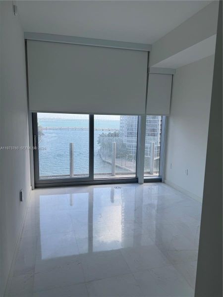 Spacious, unfurnished interior of a new home in Aston Martin Residences, Miami (Image 54).