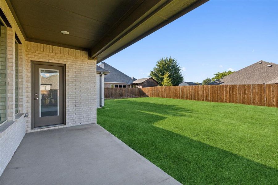 Patio furniture would be perfect for this covered porch.  You can grill with gas because there's a gas connection spigot around the corner.