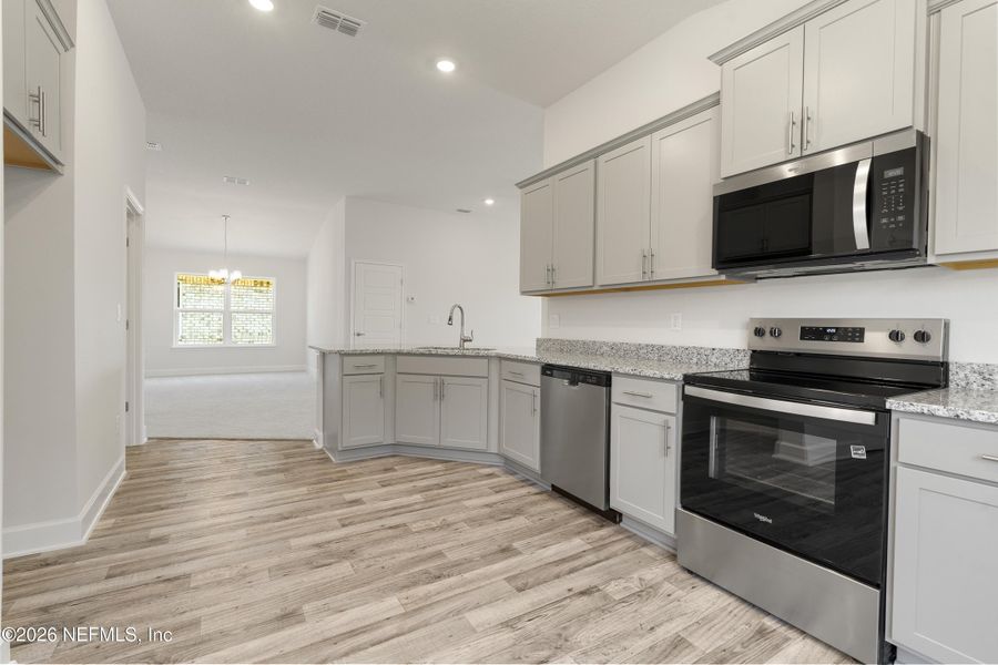 Furnished interior view inside a new home in Shadow Crest at Rolling Hills, Green Cove Springs (Image 7).