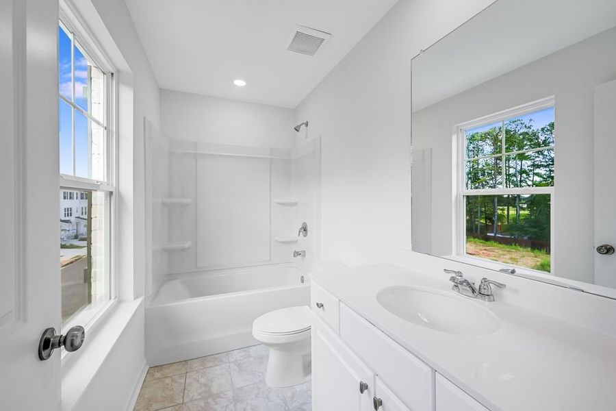 Furnished interior view inside a new home in Chandler Run, Tucker (Image 4).