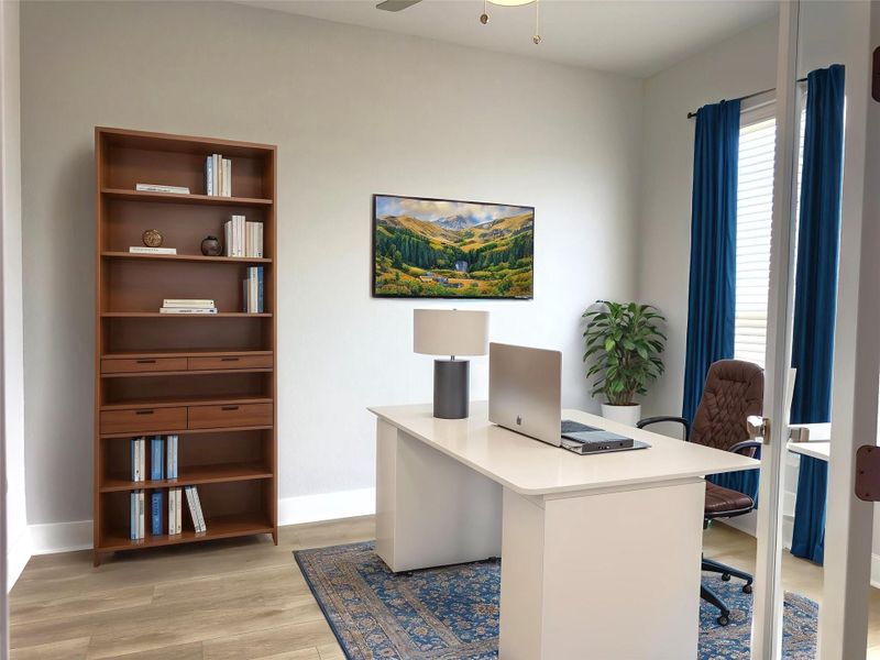 Furnished interior view inside a new home in The Colony 50', Bastrop (Image 9).