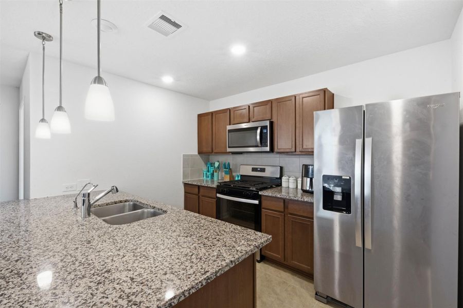 Furnished interior view inside a new home in , Katy (Image 8).
