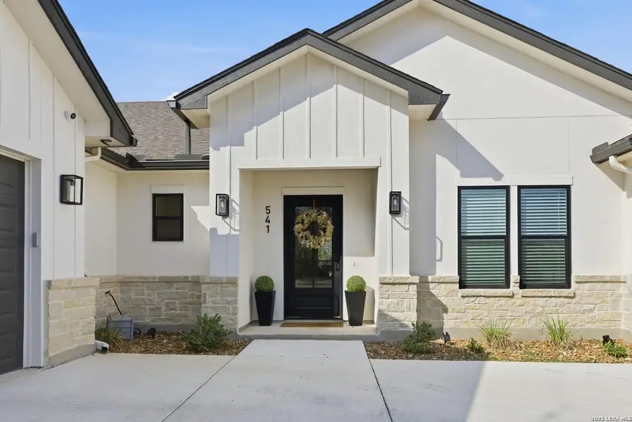 Exterior details and patio area of a home in , Bandera (Image 31).