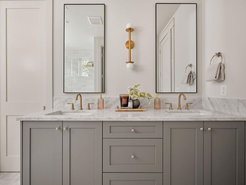 Bathroom featuring double vanity Bathroom featuring double vanity