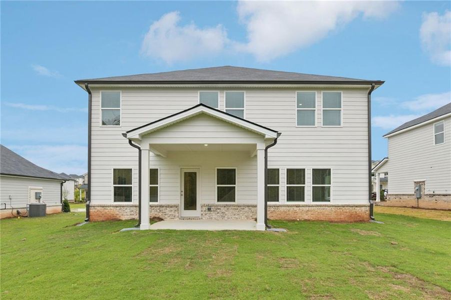 Exterior details and patio area of a home in Preserve at Mountain Creek, Pendergrass (Image 24).
