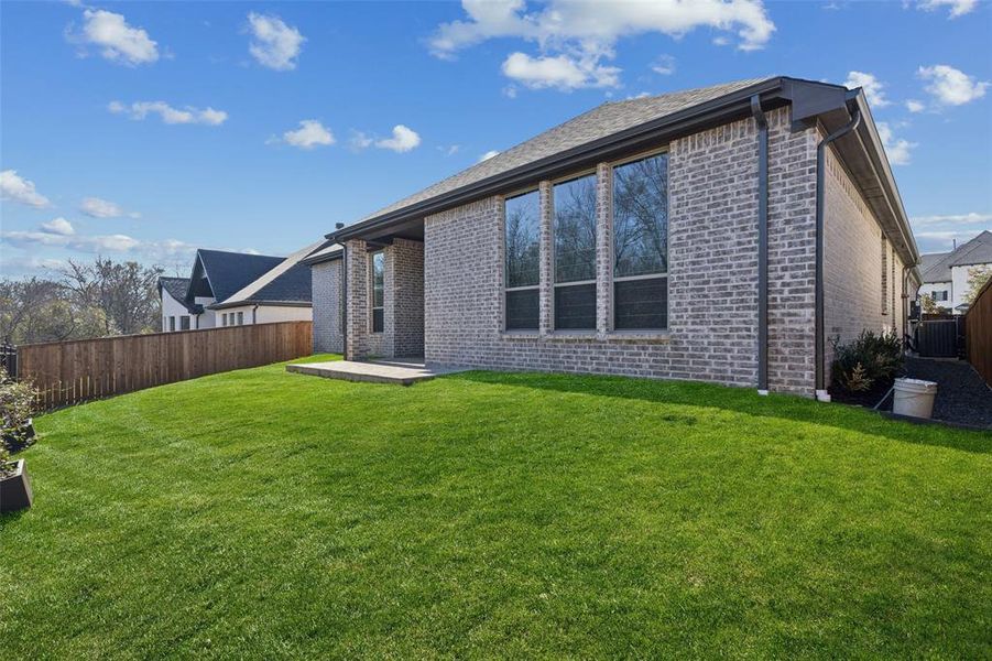 Exterior details and patio area of a home in , Aubrey (Image 25).
