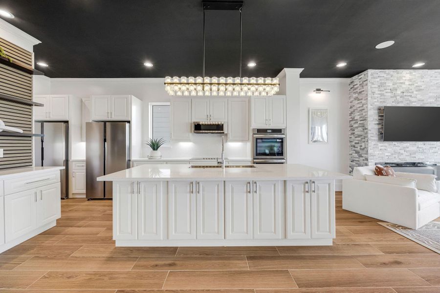 Double refrigerators, Double ovens, and double dishwashers.