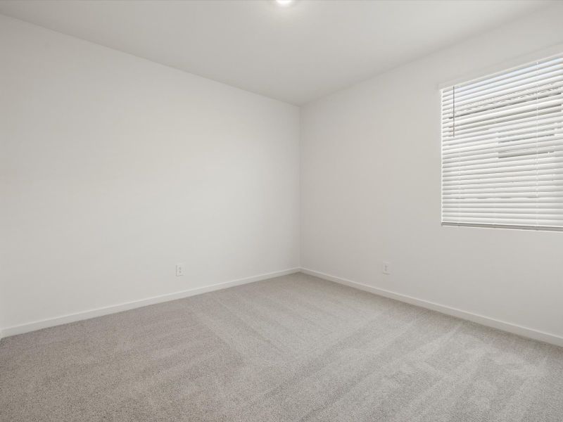 Spacious, unfurnished interior of a new home in Mesquite Mountain Ranch at Frontera, Surprise (Image 11).