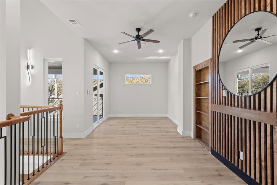 Hall featuring light hardwood / wood-style floors