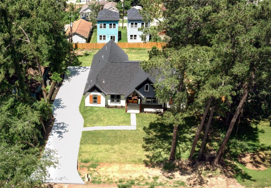 Front exterior of a new home in , Montgomery, TX, highlighting curb appeal (Image 25).
