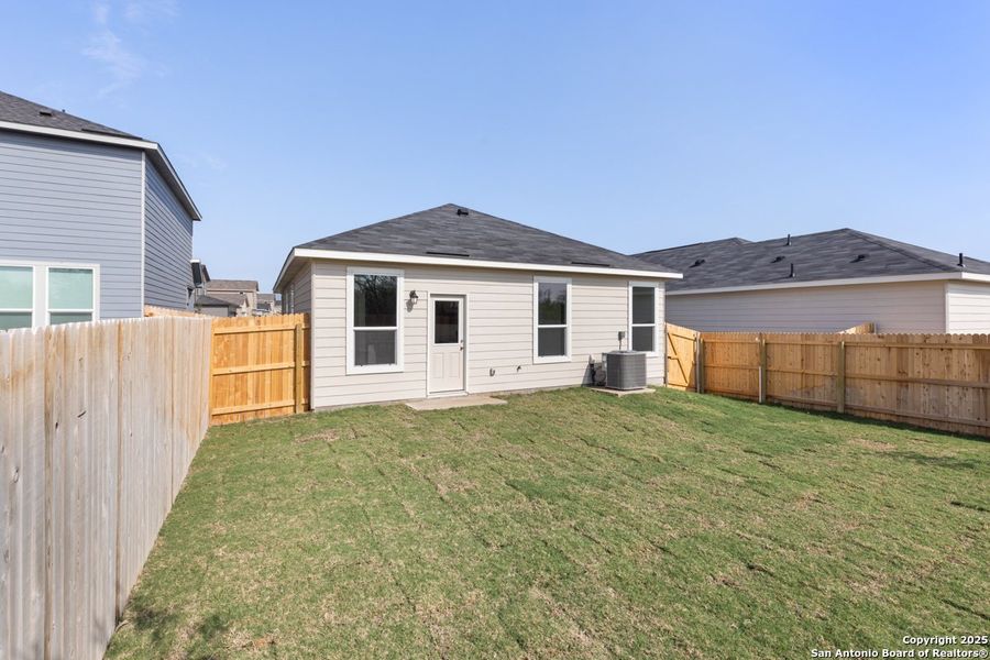 Exterior details and patio area of a home in Southton Cove, Elmendorf (Image 3). Exterior details and patio area of a home in Southton Cove, Elmendorf (Image 3).