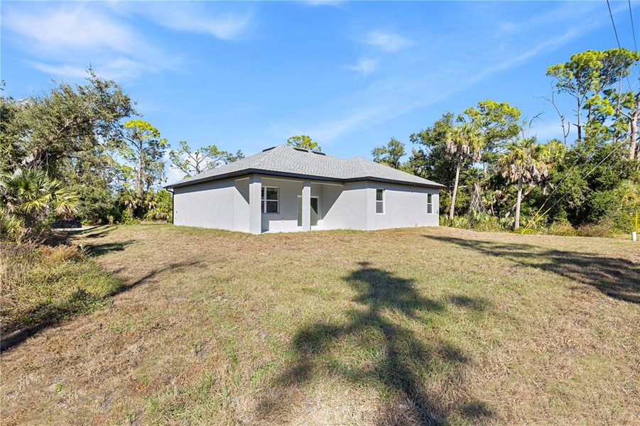 Exterior details and patio area of a home in , Port Charlotte (Image 28).