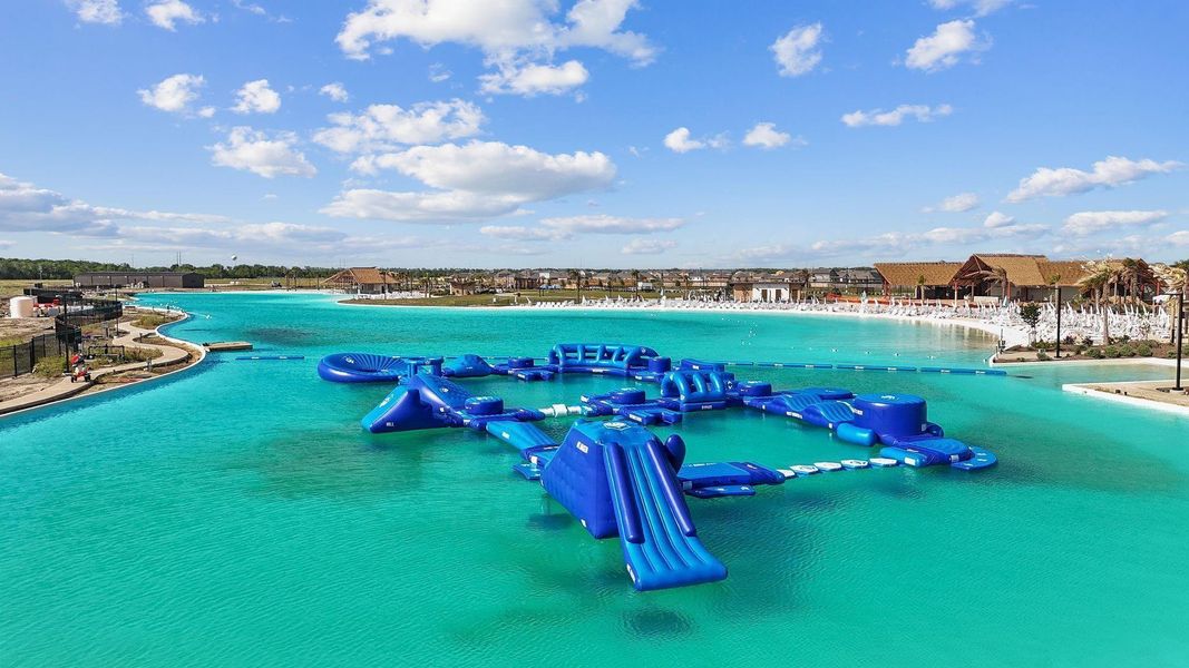Lagoon is a 40-acre oasis featuring Mediterranean blue waters and white-sand beaches. The community's signature amenity is easily accessible and offers opportunities to swim, paddleboard, kayak and sail. A swim-up bar provides snacks and beverages for hungry beachcombers. In the evenings, top musical acts take the stage. Additional amenities include a recreation center for meeting up with friends and neighbors, a playground where kids can burn off energy, trails, an event lawn, a performance stage and food