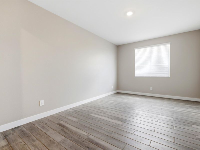 Spacious, unfurnished interior of a new home in Blossom Rock Signature Series, Apache Junction (Image 16). Spacious, unfurnished interior of a new home in Blossom Rock Signature Series, Apache Junction (Image 16).