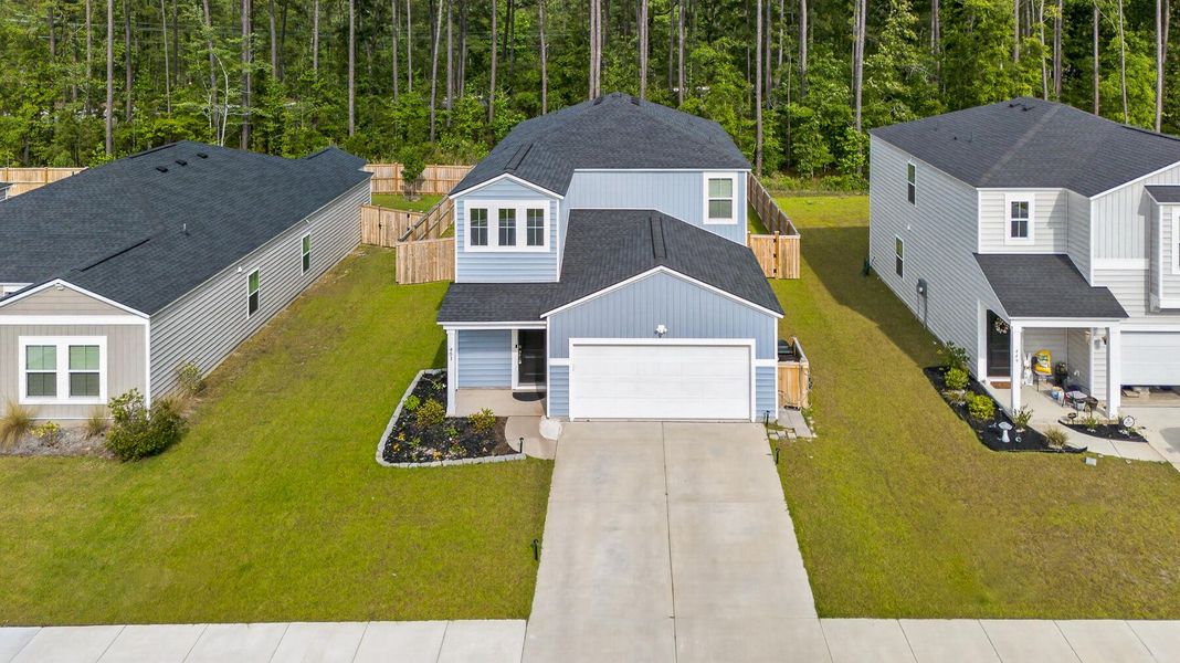 Front exterior of a new home in Cypress Preserve, Moncks Corner, SC, highlighting curb appeal (Image 27).