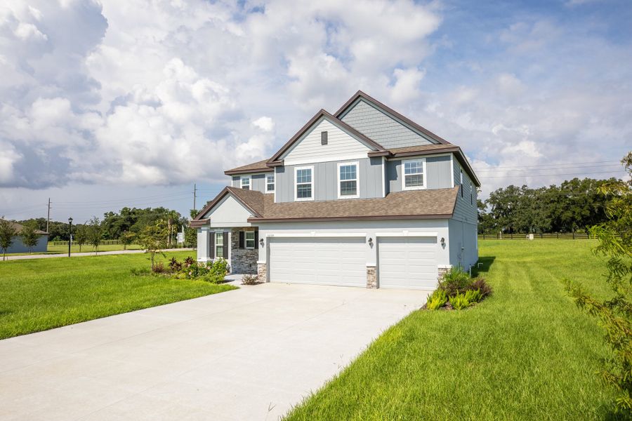 Representative exterior photo of a completed home built from the Columbus by Maronda Homes in Seminole Bend, Pensacola, FL (Image 28). Representative exterior photo of a completed home built from the Columbus by Maronda Homes in Seminole Bend, Pensacola, FL (Image 28).