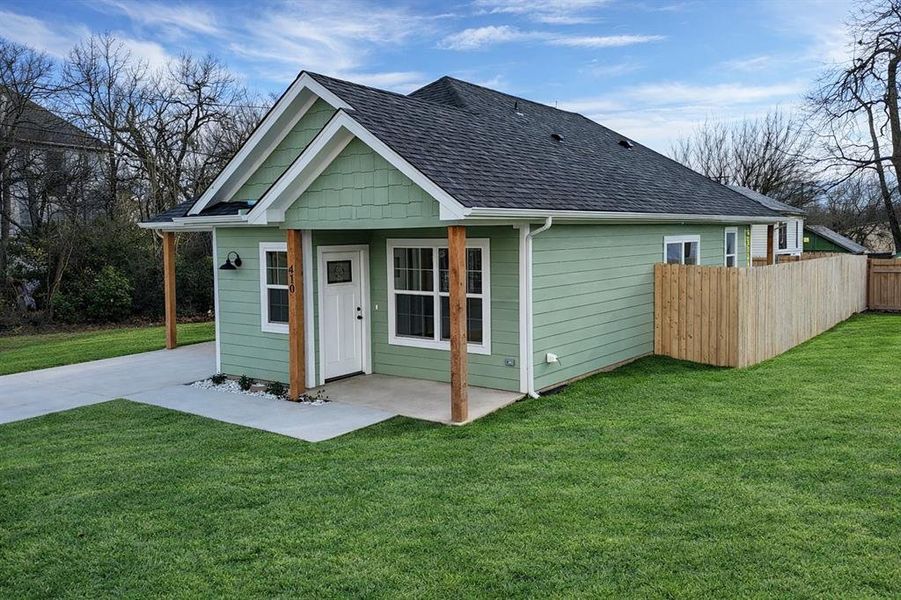 Exterior details and patio area of a home in , Denison (Image 22).