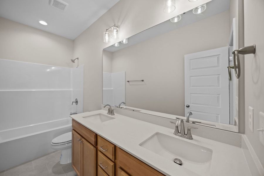 Furnished interior view inside a new home in Kennedy's Crossing, Grimesland (Image 11).