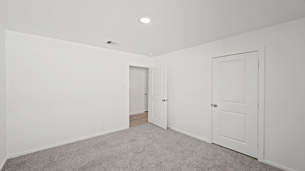 Representative unfurnished interior of a home built from the Carson by D.R. Horton in Lexington Heights, Willis (Image 22).