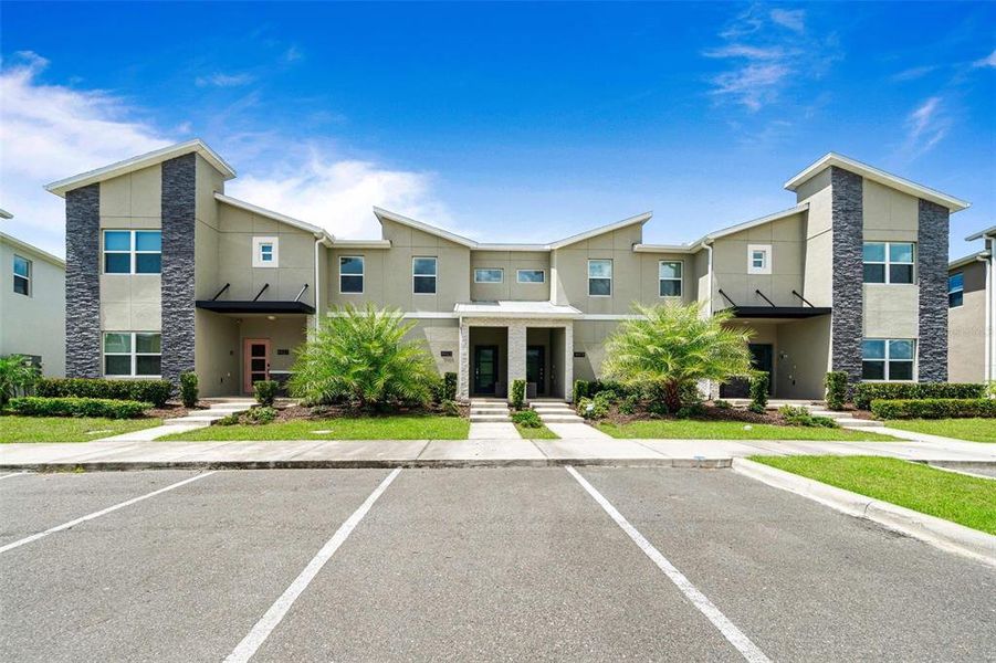 Front exterior of a new home in , Kissimmee, FL, highlighting curb appeal (Image 1). Front exterior of a new home in , Kissimmee, FL, highlighting curb appeal (Image 1).