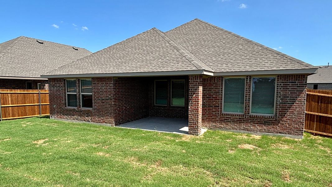 Exterior details and patio area of a home in Trailstone, Caddo Mills (Image 2).