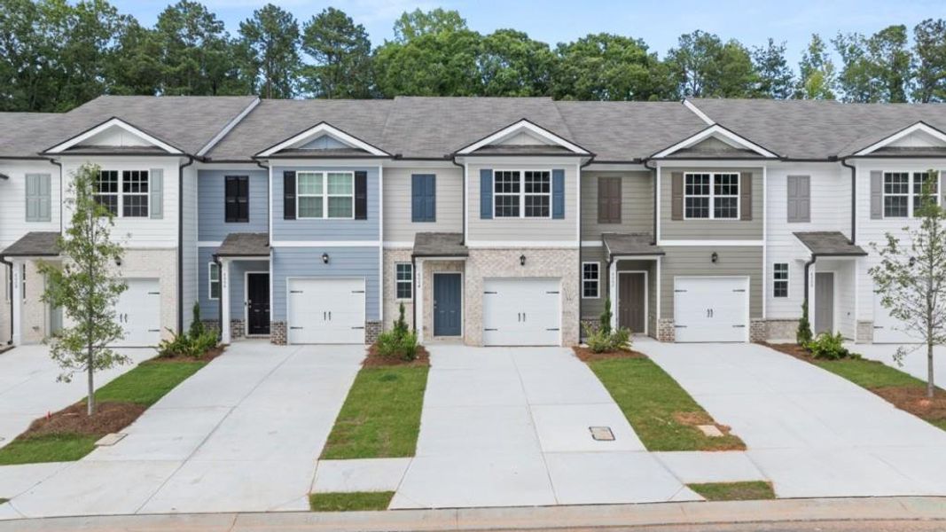 Front exterior of a new home in Woodbury Park, South Fulton, GA, highlighting curb appeal (Image 2).