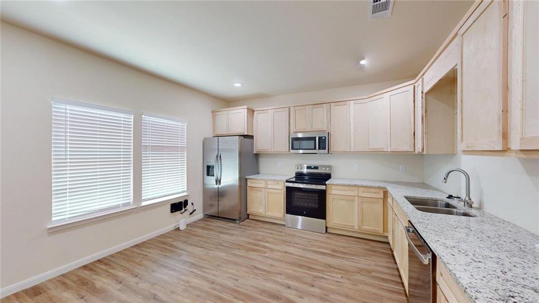 Furnished interior view inside a new home in , Justin (Image 4).