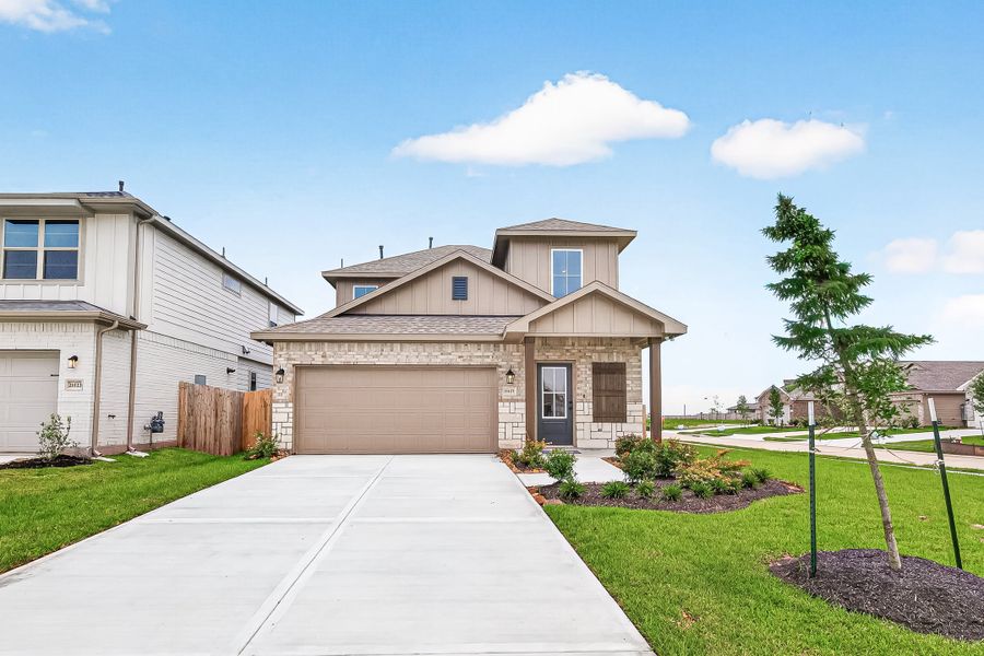 Front exterior of a new home in Aldeana, Bonney, TX, highlighting curb appeal (Image 27).