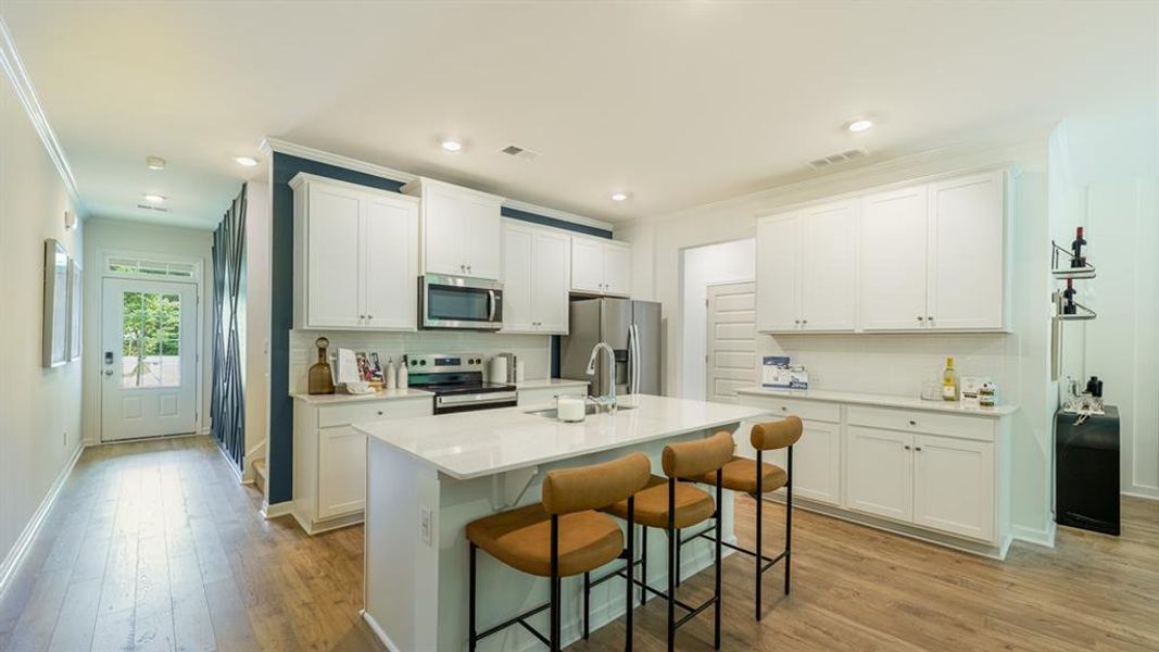 Furnished interior view inside a new home in Harvest Park, Decatur (Image 4).