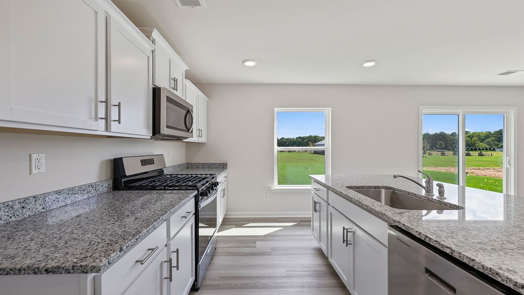 Furnished interior view inside a new home in Bentley Park, Greenwood (Image 8). Furnished interior view inside a new home in Bentley Park, Greenwood (Image 8).