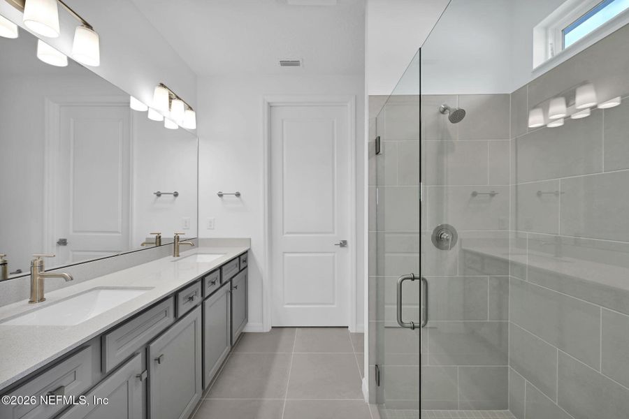 Furnished interior view inside a new home in Del Webb Wildlight, Yulee (Image 8).