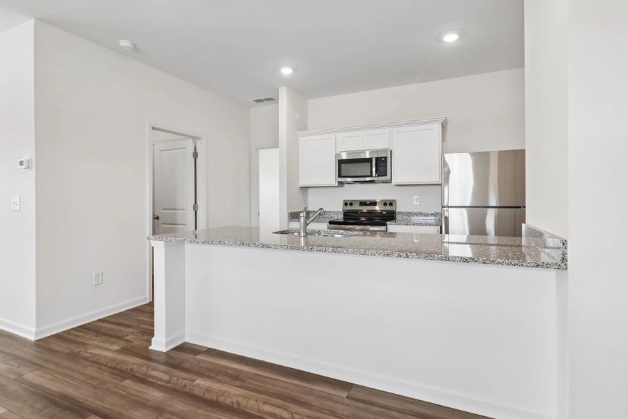 Representative furnished interior of a home built from the Larissa by Starlight Homes in Crescent Pointe, Carrollton (Image 9).