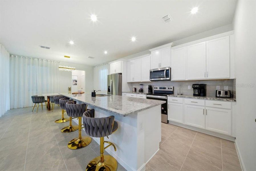 Furnished interior view inside a new home in Solara Resort, Kissimmee (Image 17).