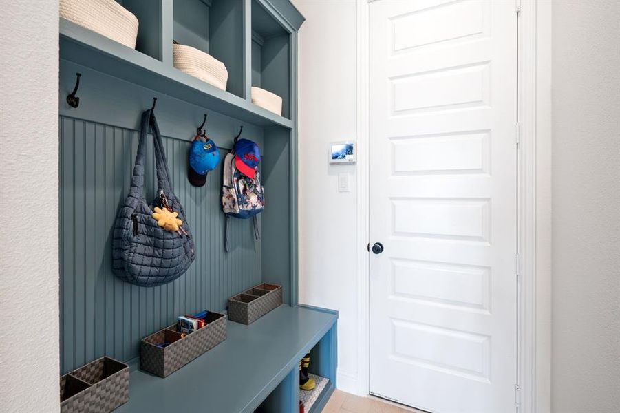 The mud room is located conveniently by one of the two garages.  This two car garage is climate controlled!