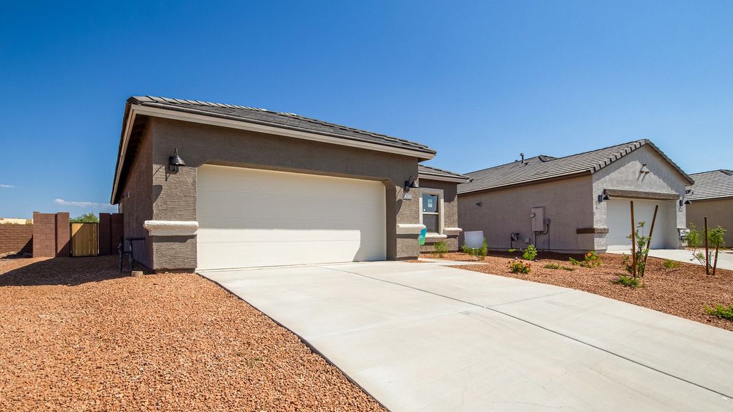 Representative exterior photo of a completed home built from the Baxter - Plan H35B by D.R. Horton in Tortolita Trails, Marana, AZ (Image 16).