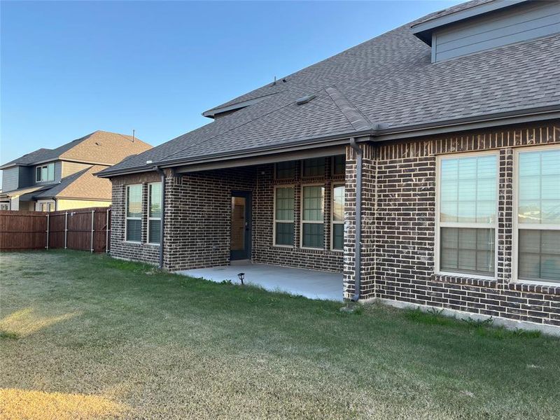 Exterior details and patio area of a home in Shady Valley Estates, Midlothian (Image 17).