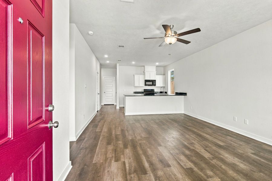 Spacious, unfurnished interior of a new home in The Cottages at Pagosa Springs, Bryan (Image 8).